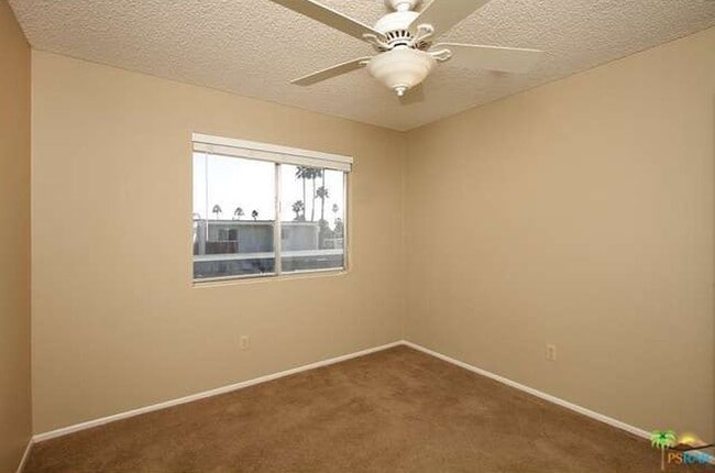 Building Photo - Spacious 4-Bedroom Condo in Indian Canyon ...