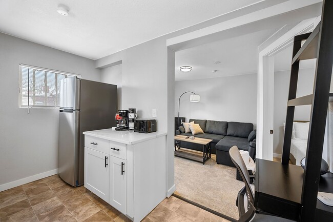 Building Photo - Remodeled and Furnished 1BD, 1BA in the Highlands with Off-Street Parking Spot