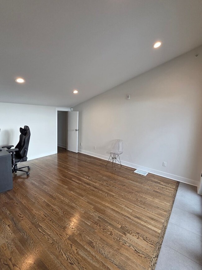 Building Photo - STUNNING 4-LEVEL TOWNHOME IN HIGHLANDS WITH SAUNA, 2-CAR GARAGE + AMAZING ROOFTOP DECK!