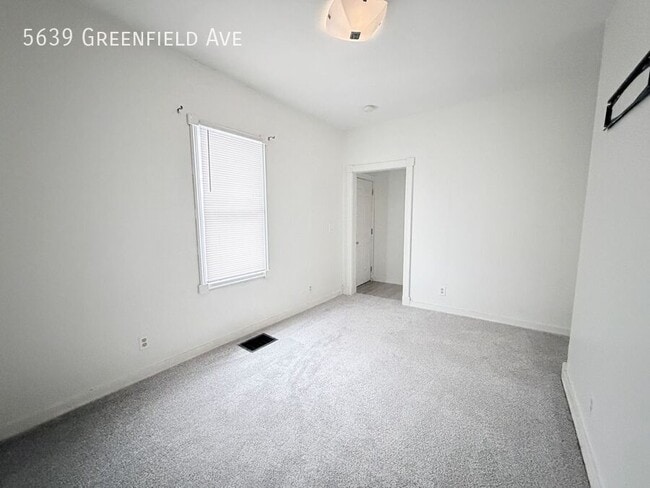 Building Photo - 5639 Greenfield Ave