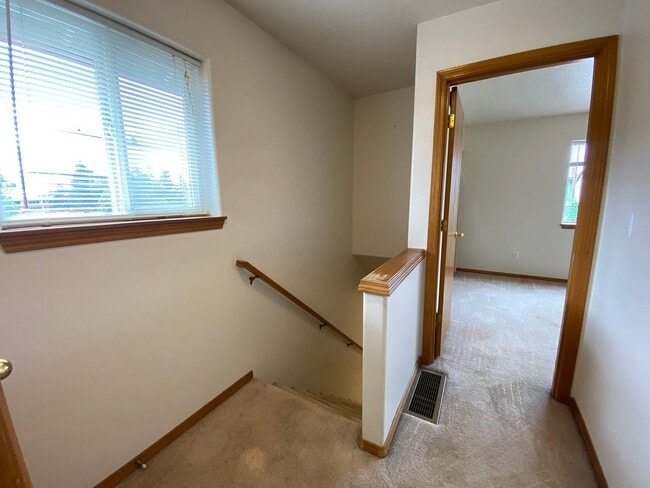Building Photo - Great Duplex Unit with Attached Garage, Covered Patio, and Two Primary Suites