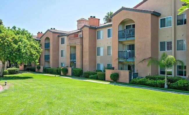 Building Photo - Resort-Style 2BR/2BA First-Floor Condo in Gated Lucera Community Near UTC