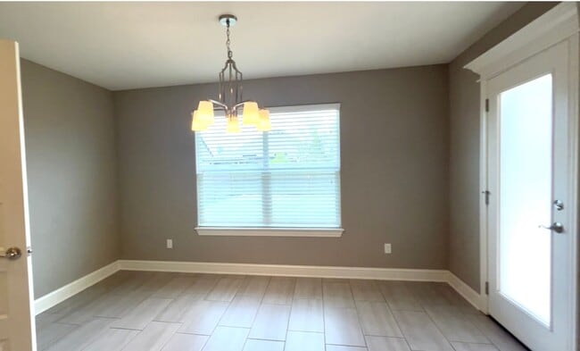 Building Photo - Gorgeous Home with Vaulted Ceilings and La...