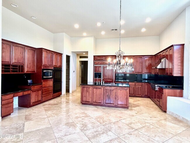 Building Photo - 7484 E Pontebella Dr