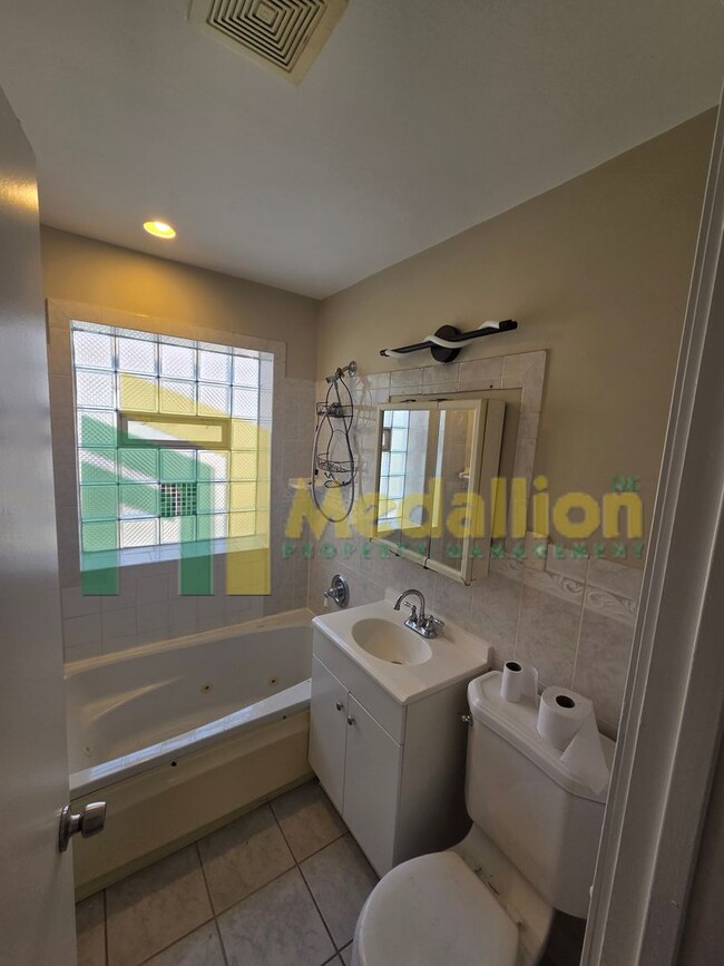 Building Photo - Spacious 4-Bedroom Home with Finished Basement and Yard Space