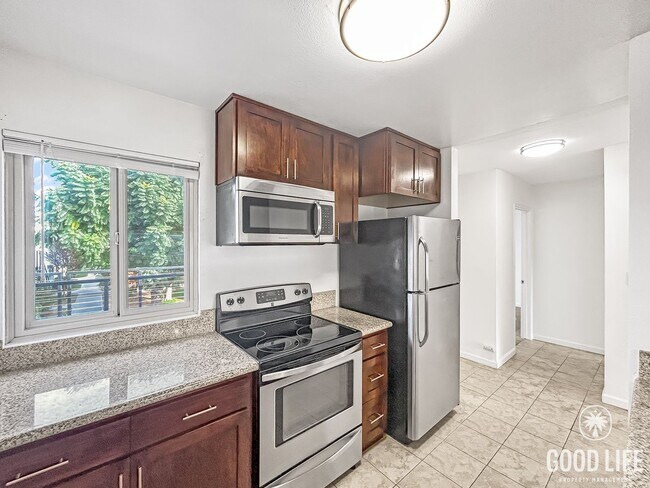 Building Photo - Bright 2BR Condo with New Carpet, Private Balcony & Great Amenities in Clairemont Mesa! $500 off ...