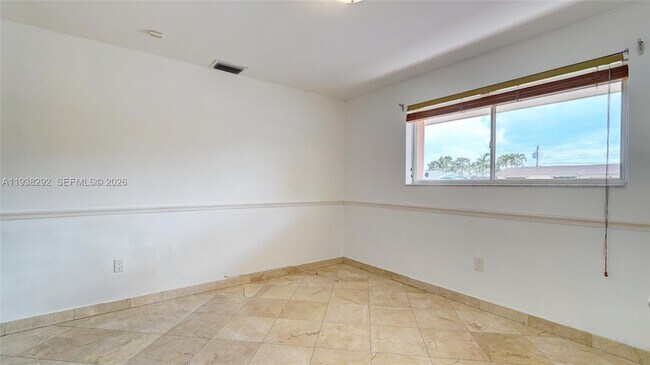 Building Photo - 1299 W 77th St