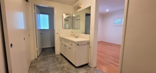 Building Photo - Classic, Midcentury 3 bedroom with Den, 2.5 bath home nestled into hillside with secluded backyar...