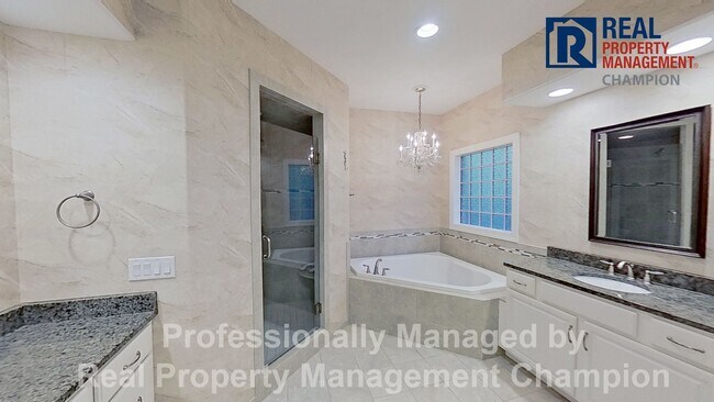 Building Photo - Custom 4BD/3BA Home with Hardwood Floors, Office, and Sunroom
