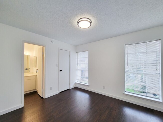 Building Photo - Beautiful two-story corner unit filled with natural light!