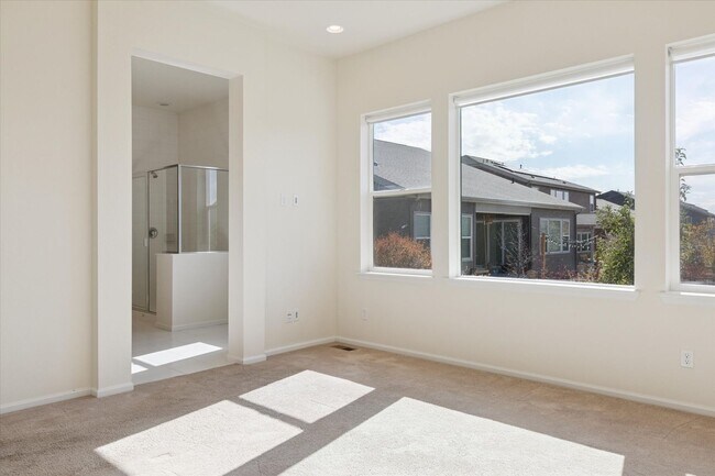 Building Photo - Modern 4-Bed Ranch in Erie with 13-Ft Ceilings, Solar Panels & EV Charger