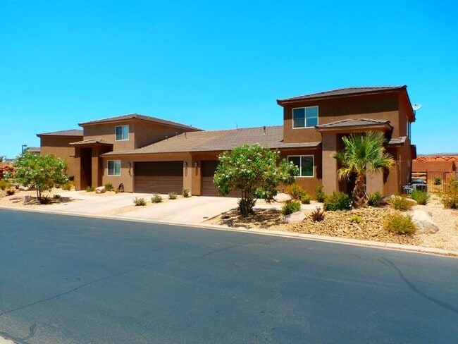 Primary Photo - 4 bed, 2.5 bath duple unit w/2 car garage