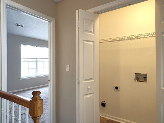 Building Photo - Cozy, 2 story, 2 bedroom, 2.5 bath Townhome Located in the Melrose Community!