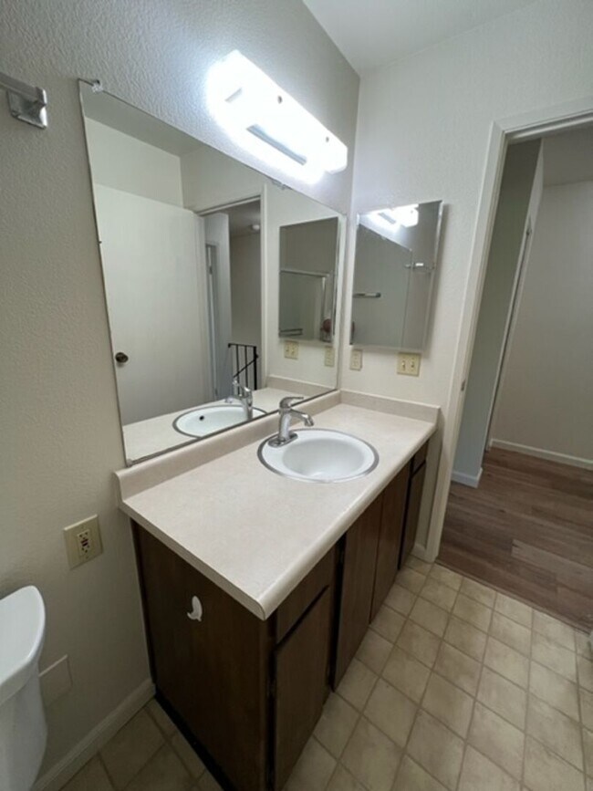 Building Photo - Spacious Condo with Private Patio