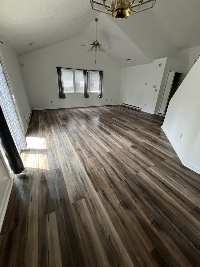 Walk into Great room with new vinyl plank flooring in 2024 - 1413 Loop Road