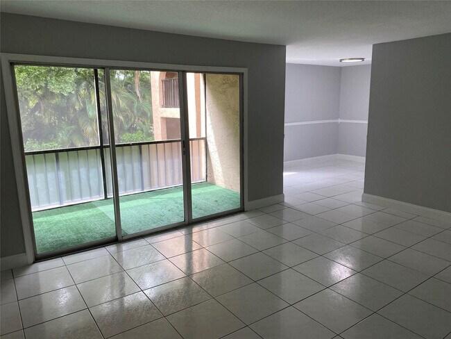 Building Photo - 2700 Coral Springs Dr