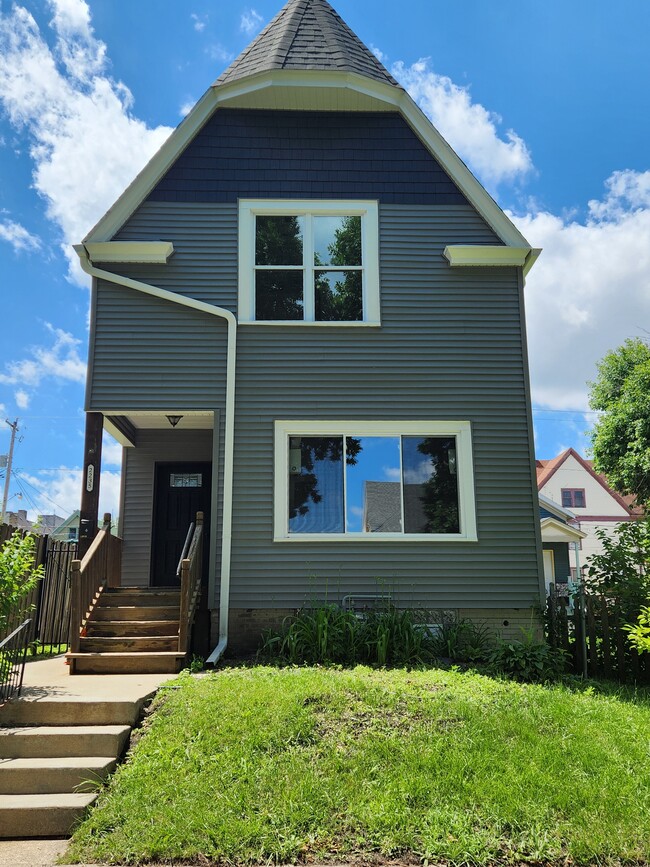 Cottage is behind the duplex on the same property. - 2235 N 1st St