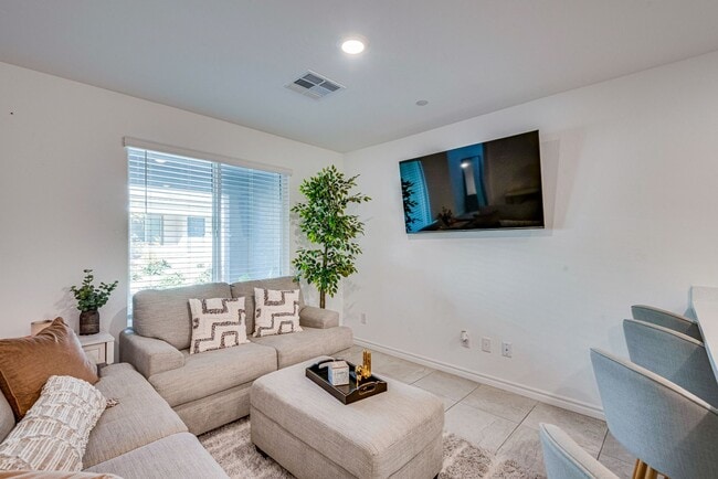 Building Photo - Furnished 3-bedroom, 2.5-bath townhome, designed to offer the ultimate in modern comfort.