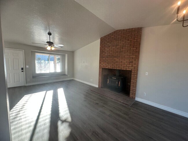 Building Photo - Quiet neighborhood, 3 bedroom, 2 bath home, huge front patio/deck, RV parking!