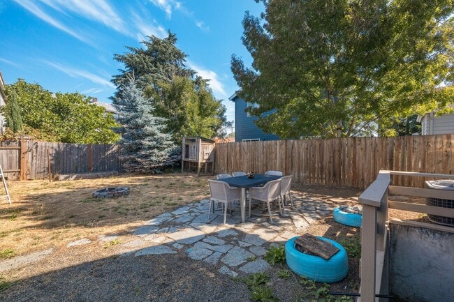 Building Photo - 1/2 Month Free! Storybook Farmhouse - Updated Kitchen, A/C, Basement, Fenced Yard, Garage, Laundr...