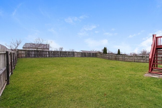 Building Photo - Inviting 4 Bedroom Home