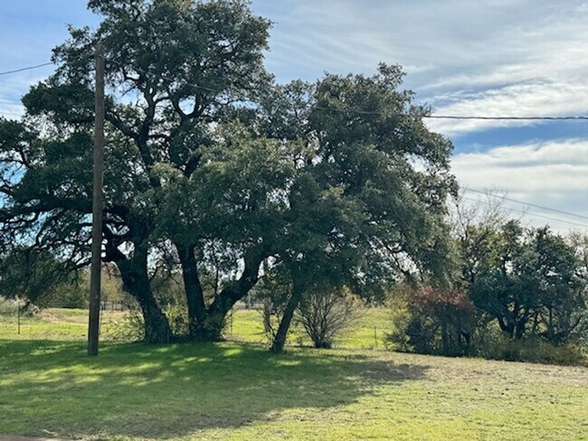 Building Photo - 4 Acres + METAL SHOP + Horses Welcome