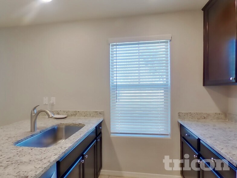 Building Photo - 8023 W Albeniz Pl