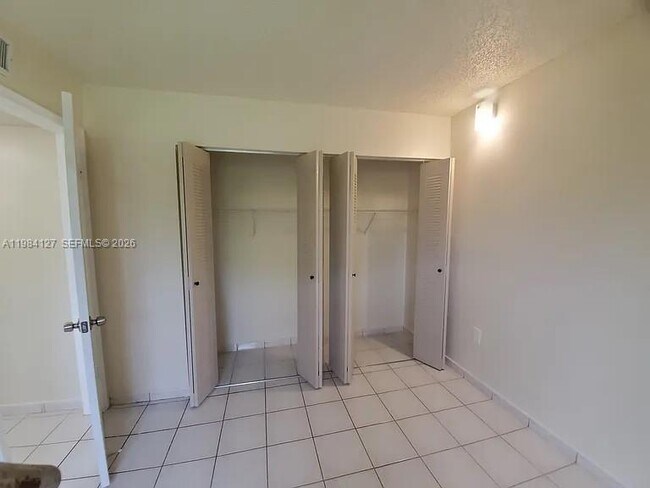 Building Photo - 10885 NW 7th St