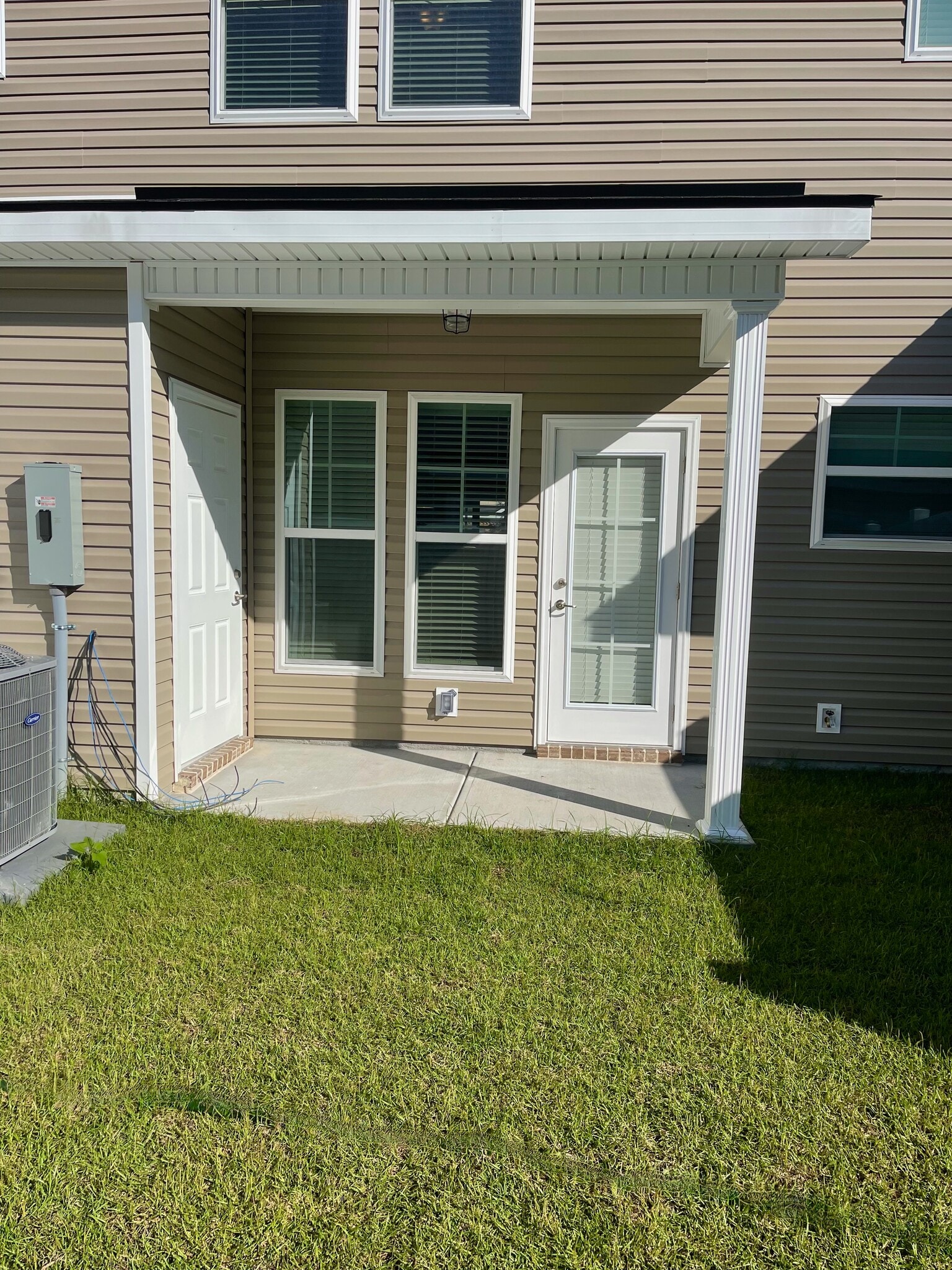 Covered Patio with outdoor storage - 102 Reese Way