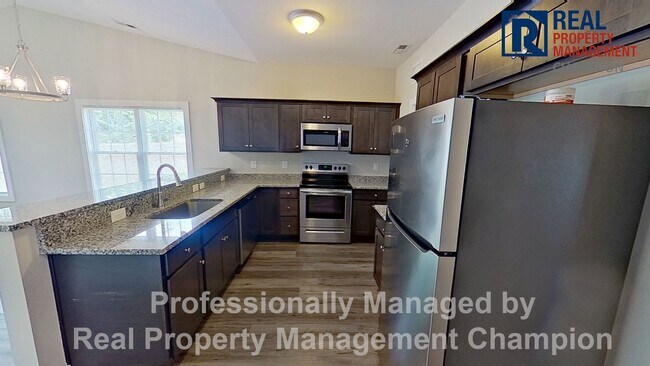 Building Photo - Charming 3 BD/2 BA with Open Floorplan and Attached Garage