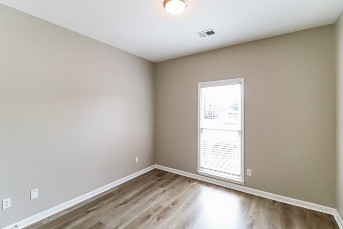 Building Photo - 5036 Devan Woods Cove