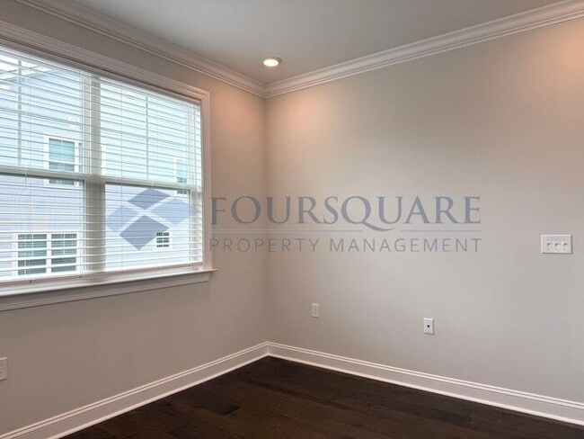 Building Photo - Spacious Corner-Lot Home with Guest Suite, Screened Porch & Detached 2-Car Garage – Resort-Style ...