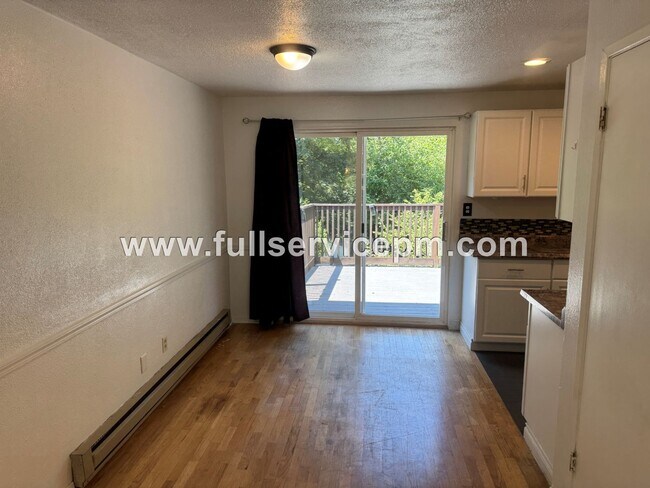 Building Photo - Spacious 4-Bedroom Upper-Level Home with Fireplace, Bonus Room & Large Deck