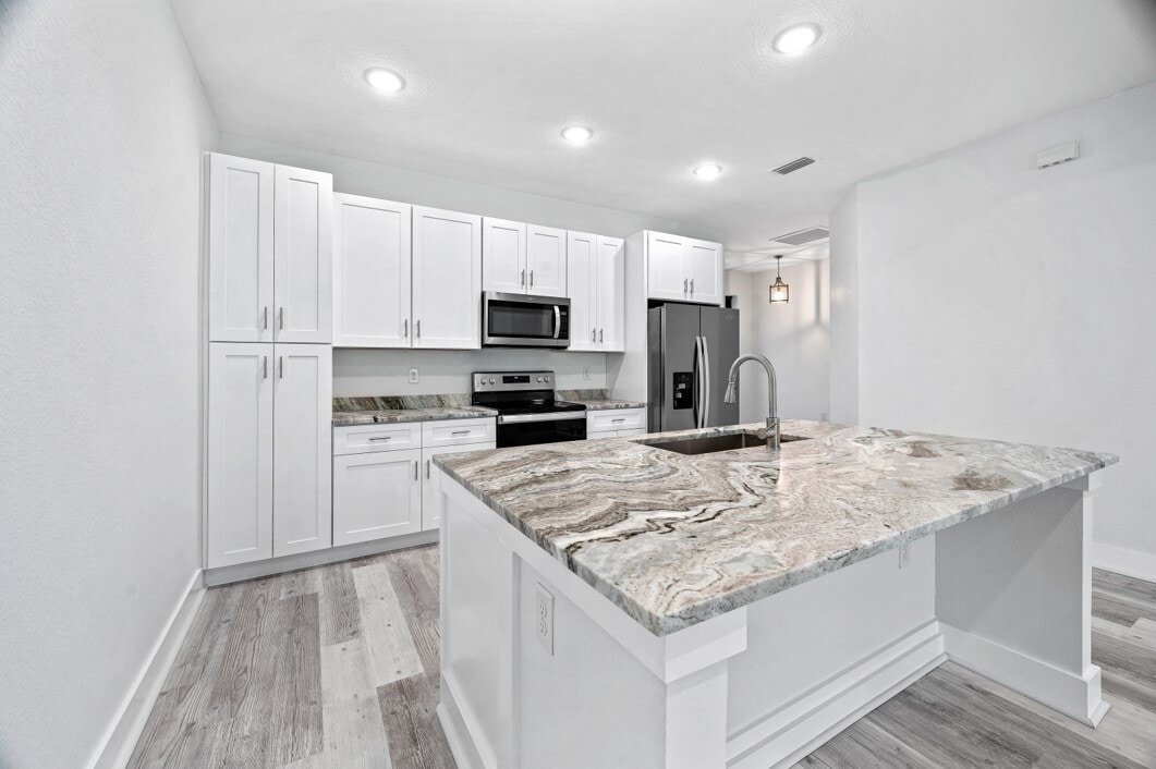 Modern kitchen, stainless appliances - 26382 Explorer Rd