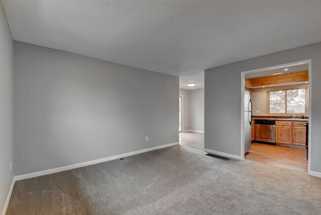 Building Photo - 4 bedroom, 2 bath home with 2 car garage, with mountain views