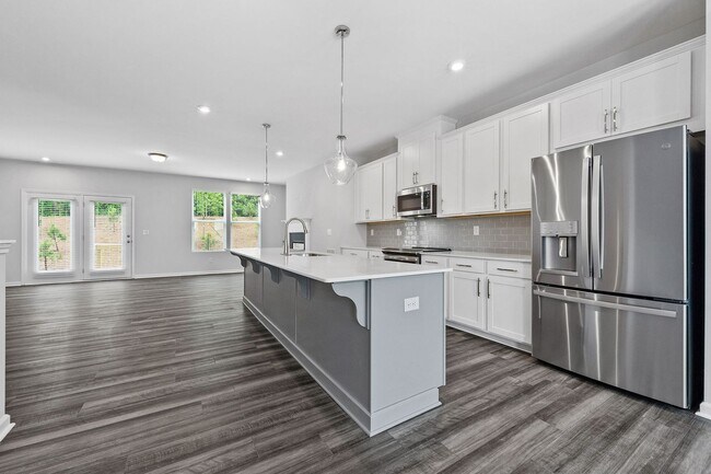 Building Photo - BRAND NEW Townhome located in Westside Ben...