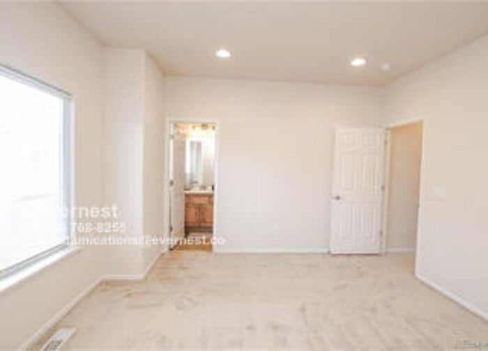 Building Photo - 3155 E 104th Ave