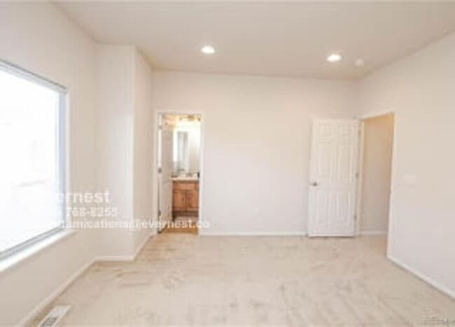 Building Photo - Spacious 2-Bedroom Condo with Fireplace, B...