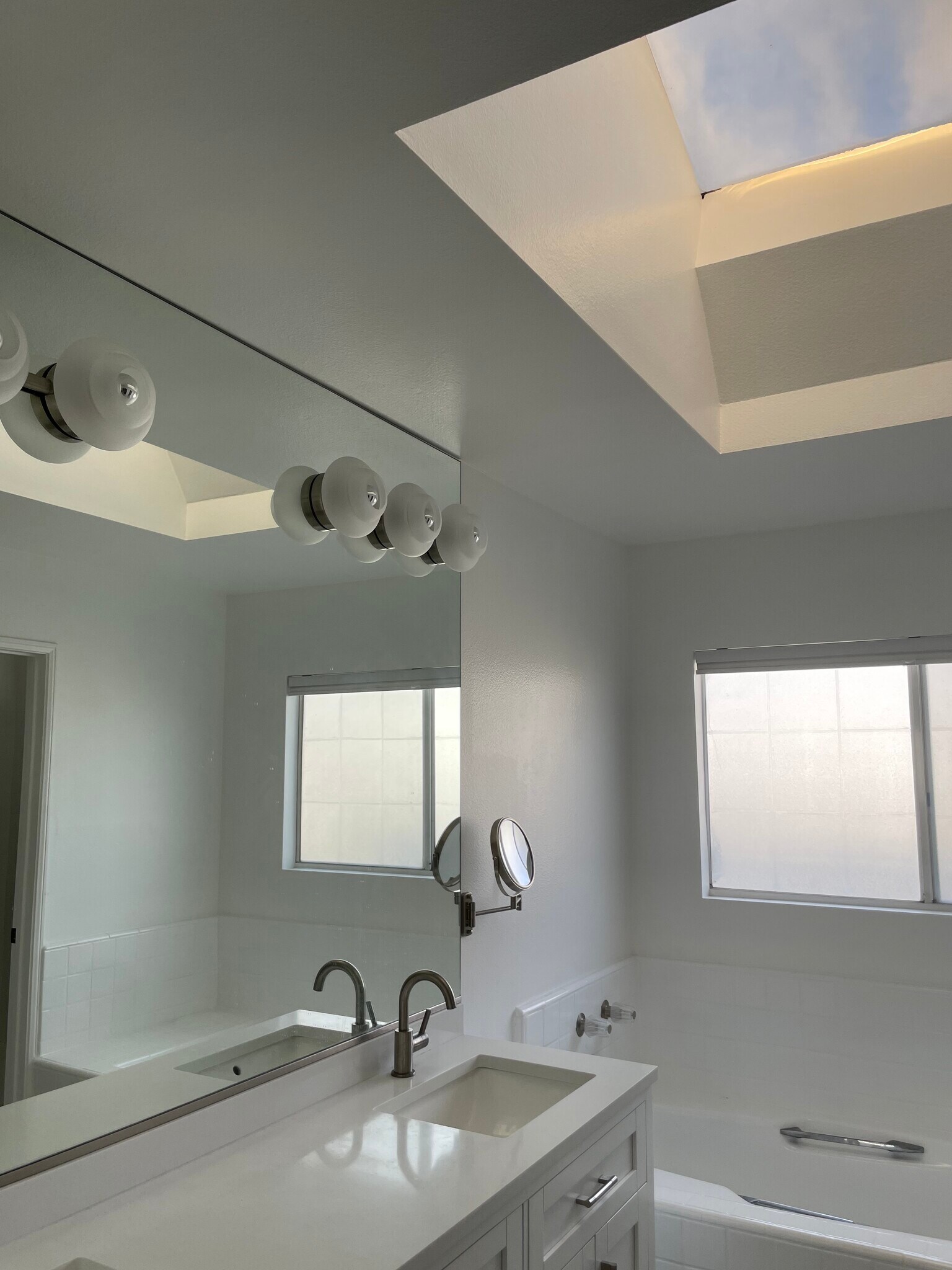 En suite bathroom filled with lots of natural light - 2220 Curtis Ave