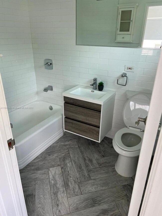 Building Photo - 9910 Collins Ave