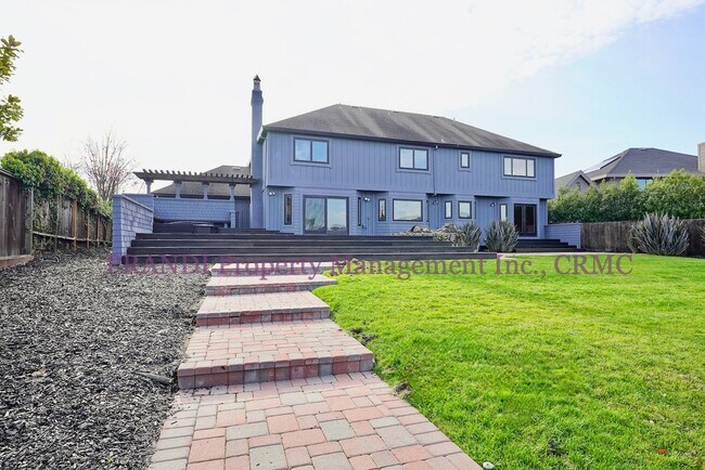 Building Photo - Sleek, Expansive, Designer Home with Priva...