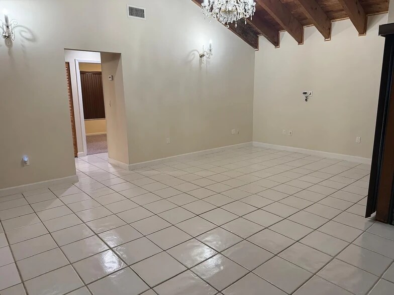 Spacious living room with sloped wood ceiling - 13169 SW 91st Ct