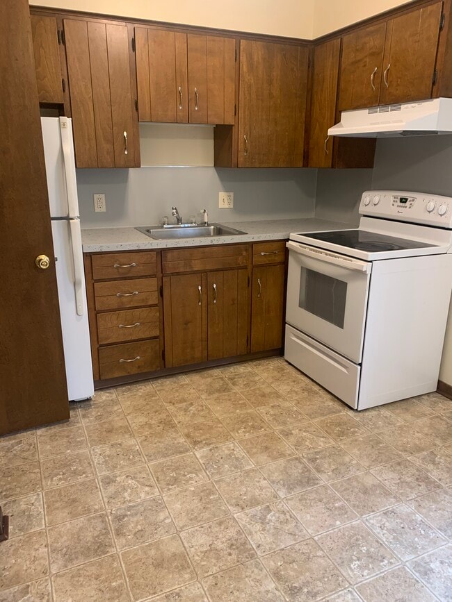 Unit available has dark kitchen cabinets - 475 W Mae Rose Ave