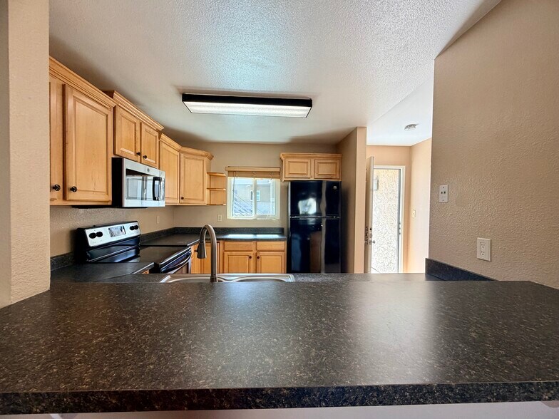 Building Photo - 7545 Charmant Dr