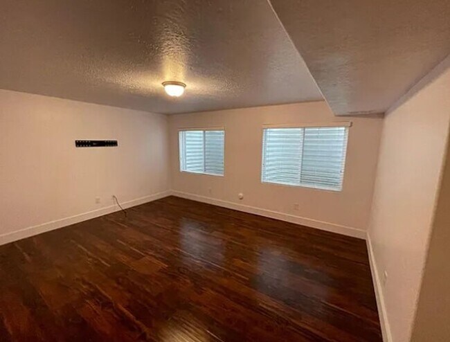 Building Photo - Spacious 4-Bedroom Home with Finished Basement in Taylorsville