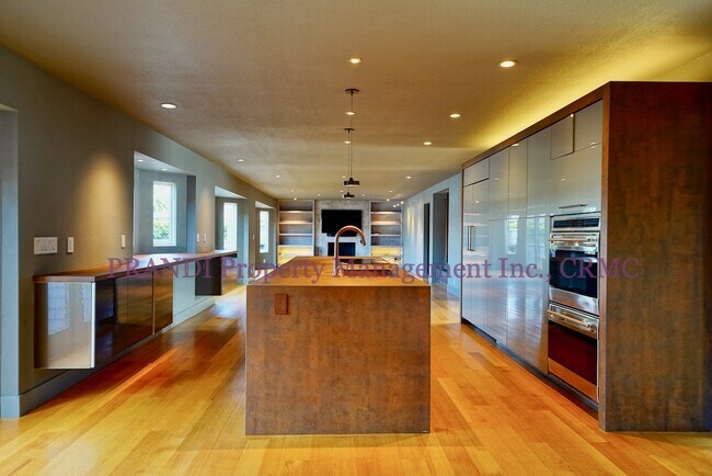 Building Photo - Sleek, Expansive, Designer Home with Priva...