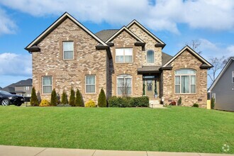 Building Photo - Pet Friendly Three Bedroom with Bonus!