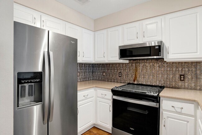 Building Photo - One Bedroom Condo with Loft, One-car Garag...