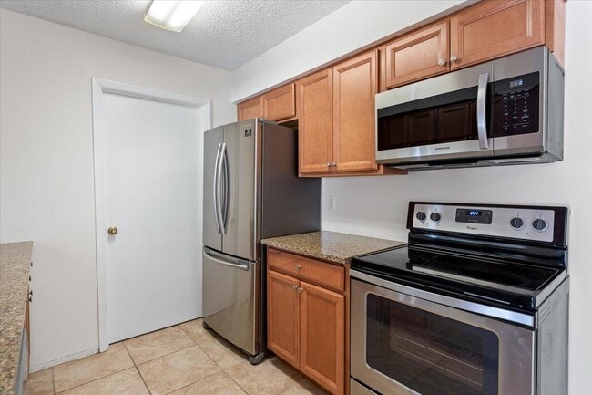 Building Photo - 3902 NW Cinnamon Tree Cir