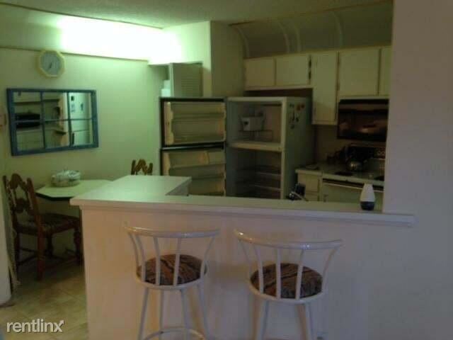 Building Photo - 2 br, 2 bath Condo - 7535 S Oriole Blvd Ap...